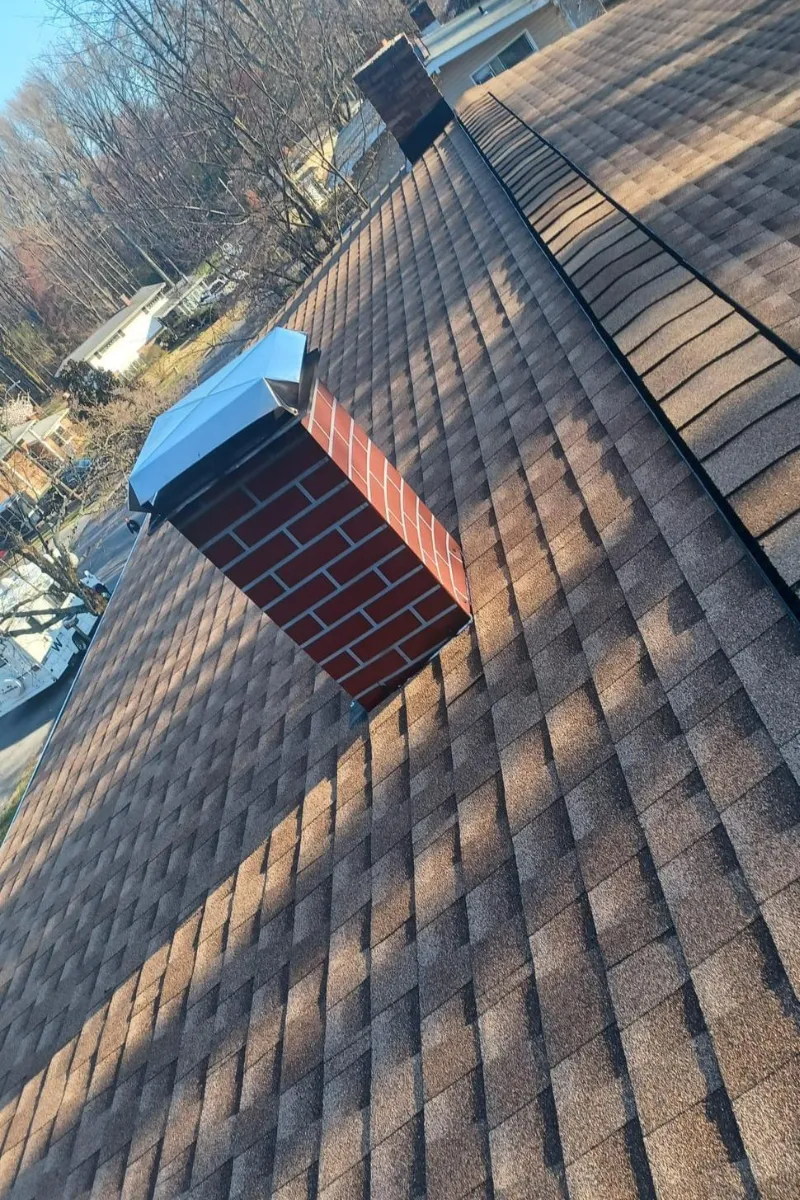 Chimney cap and flashing installation